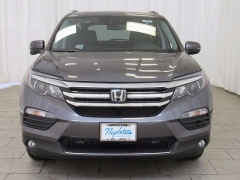 New 2018  Honda Pilot 4d SUV AWD Touring at Promax Motors near Davenport, IA