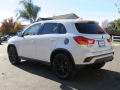 New 2019  Mitsubishi Outlander Sport 4d SUV FWD 2.0L LE at Promax Motors near Davenport, IA