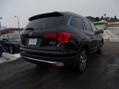 New 2018  Honda Pilot 4d SUV AWD Touring at Promax Motors near Davenport, IA