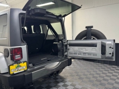 Used 2014  Jeep Wrangler Unlimited 4WD 4dr Freedom Edition &ast;Ltd Avail&ast; at AutoCenters Bonne Terre near Bonne Terre&comma; MO