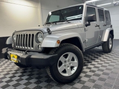 Used 2014  Jeep Wrangler Unlimited 4WD 4dr Freedom Edition &ast;Ltd Avail&ast; at AutoCenters Bonne Terre near Bonne Terre&comma; MO
