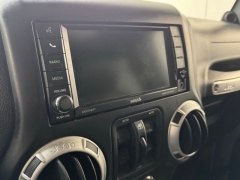 Used 2014  Jeep Wrangler Unlimited 4WD 4dr Freedom Edition &ast;Ltd Avail&ast; at AutoCenters Bonne Terre near Bonne Terre&comma; MO