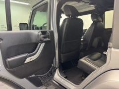 Used 2014  Jeep Wrangler Unlimited 4WD 4dr Freedom Edition &ast;Ltd Avail&ast; at AutoCenters Bonne Terre near Bonne Terre&comma; MO
