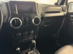 Used 2014  Jeep Wrangler Unlimited 4WD 4dr Freedom Edition &ast;Ltd Avail&ast; at AutoCenters Bonne Terre near Bonne Terre&comma; MO