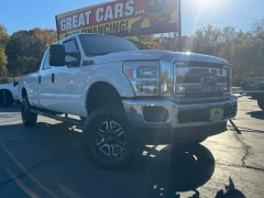  2015 Ford Super Duty F-250 4WD Crew Cab XLT at AutoCenters Bonne Terre near Bonne Terre&comma; MO