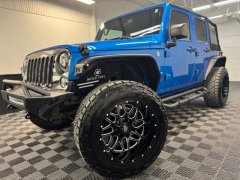 Used 2014  Jeep Wrangler Unlimited 4d Convertible Sport Freedom at AutoCenters Bonne Terre near Bonne Terre&comma; MO