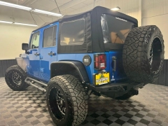 Used 2014  Jeep Wrangler Unlimited 4d Convertible Sport Freedom at AutoCenters Bonne Terre near Bonne Terre&comma; MO