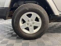 Used 2014  Jeep Wrangler Unlimited 4WD 4dr Freedom Edition &ast;Ltd Avail&ast; at AutoCenters Bonne Terre near Bonne Terre&comma; MO