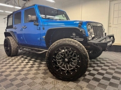 Used 2014  Jeep Wrangler Unlimited 4d Convertible Sport Freedom at AutoCenters Bonne Terre near Bonne Terre&comma; MO