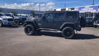 Used 2018  Jeep Wrangler JK Unlimited 4d SUV 4WD Sport at IK Auto Group near Hilo, HI