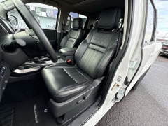 Used 2024  Nissan Frontier Crew Cab 4x4 SL at IK Auto Group near Hilo&comma; HI