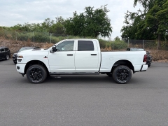 New 2026  Ram 2500 4WD Black Express 4x4 Crew Cab 6'4" Box at IK Auto Group near Hilo&comma; HI