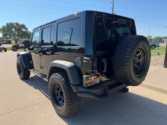 Used 2013  Jeep Wrangler Unlimited 4d Convertible Sahara Moab at AutoSmart Spirit Lake near Okoboji&comma; IA