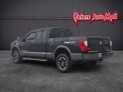 Used 2017  Nissan Titan XD 4WD Crew Cab SL Diesel at Peters Auto Mall near High Point&comma; NC