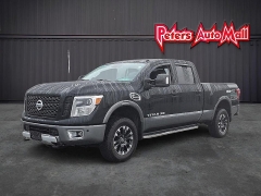 Used 2017  Nissan Titan XD 4WD Crew Cab SL Diesel at Peters Auto Mall near High Point&comma; NC