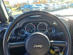 Used 2010  Jeep Wrangler Unlimited 4d Convertible 4WD Sport at Peters Auto Mall near High Point, NC