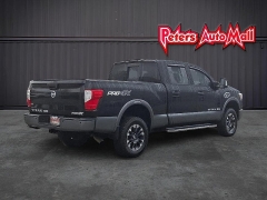 Used 2017  Nissan Titan XD 4WD Crew Cab SL Diesel at Peters Auto Mall near High Point&comma; NC
