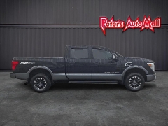 Used 2017  Nissan Titan XD 4WD Crew Cab SL Diesel at Peters Auto Mall near High Point&comma; NC