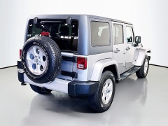 Used 2014  Jeep Wrangler Unlimited 4d Convertible Sahara at Graham Auto Mall near Mansfield&comma; OH