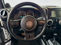 Used 2014  Jeep Wrangler Unlimited 4d Convertible Sahara at Graham Auto Mall near Mansfield&comma; OH