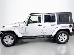 Used 2010  Jeep Wrangler Unlimited 4d Convertible 4WD Sahara at Graham Auto Mall near Mansfield&comma; OH