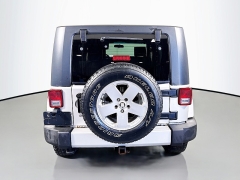 Used 2010  Jeep Wrangler Unlimited 4d Convertible 4WD Sahara at Graham Auto Mall near Mansfield&comma; OH