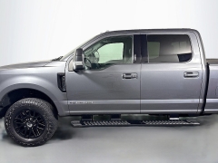 Used 2021  Ford Super Duty F-250 4WD LARIAT Crew Cab SRW 6&period;75' Box at Graham Auto Mall near Mansfield&comma; OH