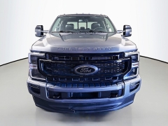 Used 2021  Ford Super Duty F-250 4WD LARIAT Crew Cab SRW 6&period;75' Box at Graham Auto Mall near Mansfield&comma; OH