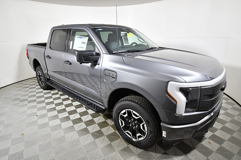 New 2023  Ford F-150 Lightning XLT 4WD SuperCrew Standard at Graham Auto Mall near Mansfield, OH