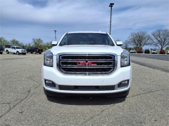 Used 2015 GMC Yukon 4d SUV 4WD SLE at Maxx Loans near ,