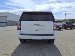 Used 2015 GMC Yukon 4d SUV 4WD SLE at Maxx Loans near ,