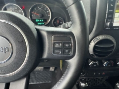 Used 2015  Jeep Wrangler Unlimited 4d Convertible Sport Willys Wheeler at NEXCAR near Spring&comma; TX