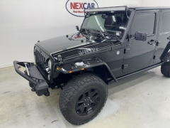 Used 2015  Jeep Wrangler Unlimited 4d Convertible Sport Willys Wheeler at NEXCAR near Spring&comma; TX