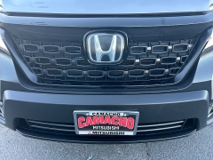 Used 2020  Honda Passport 4d SUV FWD Touring at Camacho Mitsubishi near Palmdale&comma; CA