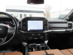 Used 2021 Ford F-150 4WD Platinum SuperCrew 6.5' Box Hybrid at Charbonneau Car Center near Dickinson, ND