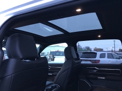 New 2023 Ram 1500 4WD Laramie Crew Cab 5'7" Box at Charbonneau Car Center near Dickinson, ND
