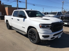 New 2023 Ram 1500 4WD Laramie Crew Cab 6'4" Box at Charbonneau Car Center near Dickinson, ND