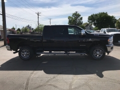 New 2023 Ram 2500 4WD Laramie Mega Cab 6'4" Box at Charbonneau Car Center near Dickinson, ND