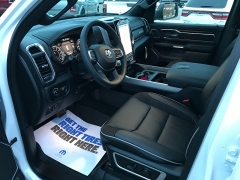 New 2023 Ram 1500 4WD Laramie Crew Cab 5'7" Box at Charbonneau Car Center near Dickinson, ND