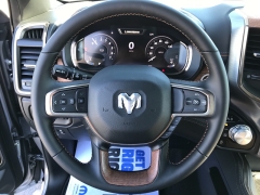 New 2023 Ram 1500 4WD Longhorn Crew Cab 5'7" Box at Charbonneau Car Center near Dickinson, ND