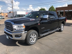 New 2023 Ram 2500 4WD Laramie Mega Cab 6'4" Box at Charbonneau Car Center near Dickinson, ND