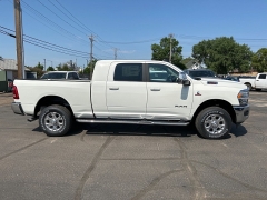 New 2023 Ram 2500 4WD Laramie Mega Cab 6'4" Box at Charbonneau Car Center near Dickinson, ND