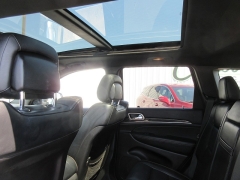 Used 2014 Jeep Grand Cherokee 4d SUV 4WD Overland at Charbonneau Car Center near Dickinson, ND