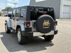 Used 2013 Jeep Wrangler Unlimited 4d Convertible Sahara at Paradise Motors near Lansing, MI
