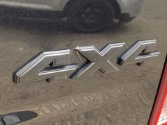 Used 2019 Ram 1500 Classic 4WD Quad Cab Tradesman at Paradise Motors near Lansing, MI