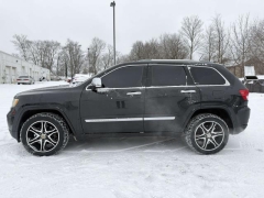 Used 2011  Jeep Grand Cherokee 4d SUV 4WD Overland at Paradise Motors near Lansing&comma; MI