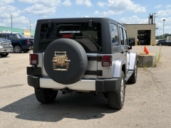 Used 2013 Jeep Wrangler Unlimited 4d Convertible Sahara at Paradise Motors near Lansing, MI