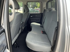 Used 2016  Ram 1500 4WD Quad Cab SLT at Paradise Motors near Lansing, MI