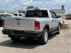Used 2016  Ram 1500 4WD Quad Cab SLT at Paradise Motors near Lansing, MI