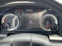 Used 2016  Ram 1500 4WD Quad Cab SLT at Paradise Motors near Lansing, MI